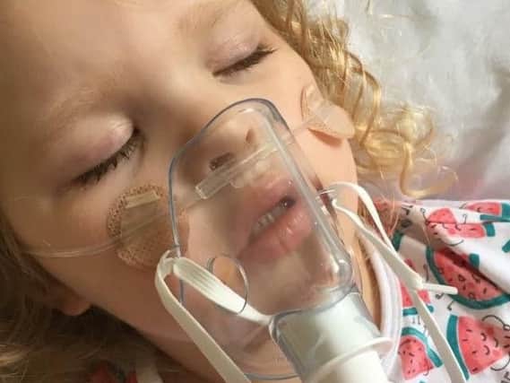 Six-year-old Mia surfers with a rare condition called Tracheomalacia which means she struggles to breathe. Photo provided by Mia's parents.