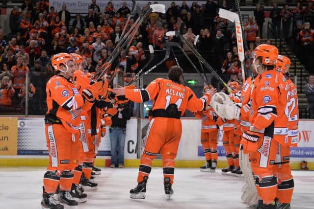 Steelers' players form a guard of honour for Eric Meland whose departure from the club was announced on Sunday night. Picture: Dean Woolley.
