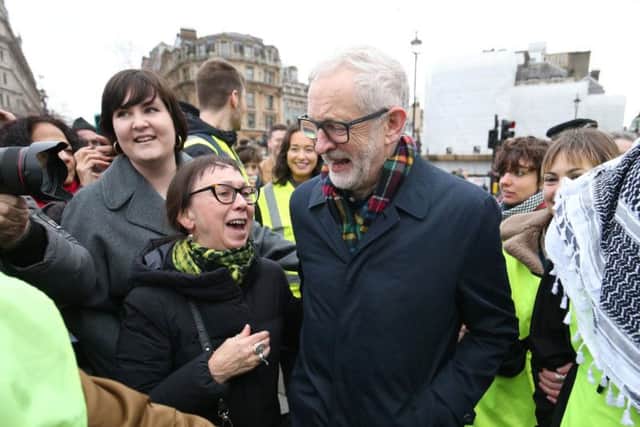 Labour leader Jeremy Corbyn leaves the stage after addressing protesters at a Campaign for Nuclear Disarmament on Saturday. Photo: Jonathan Brady/PA Wire