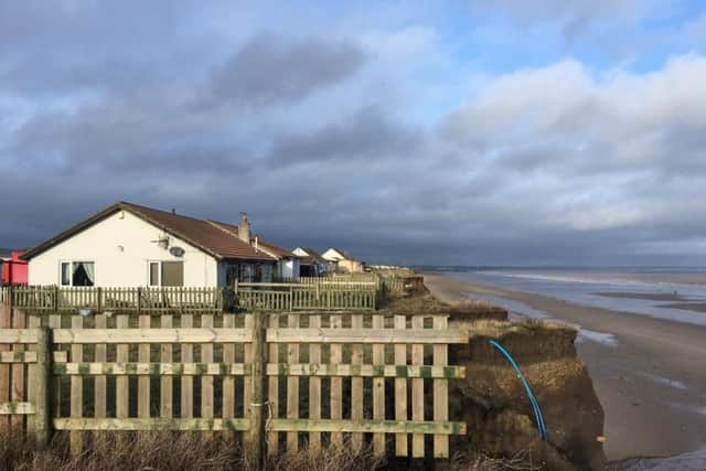 A council report says a "single erosion event" could see homes at Skipsea "becoming at imminent risk within the next year" Picture: Alex Wood