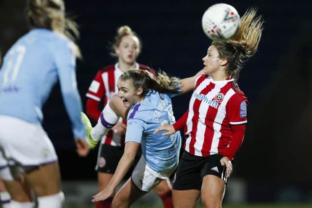 Georgia Stanway of Manchester City and Alethea Paul of Sheffield United battle for the ball. Picture: James Wilson/Sportimage