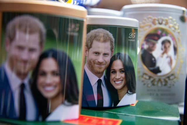 Merchandise featuring Duke and Duchess of Sussex on sale in Windsor after the couple recently announced they will be taking a step back from their Royal roles