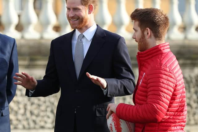 The Duke of Sussex talks with Leeds Rhino player, James Simpson, in the Buckingham Palace gardens, London, as he hosts the Rugby League World Cup 2021 draws