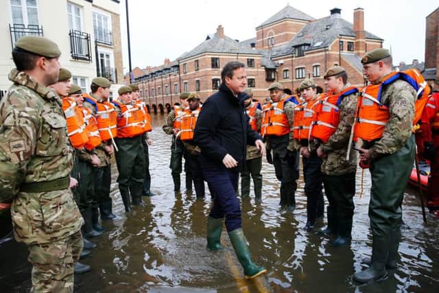 David Cameron's PR visit to York after the December 2015 floods.