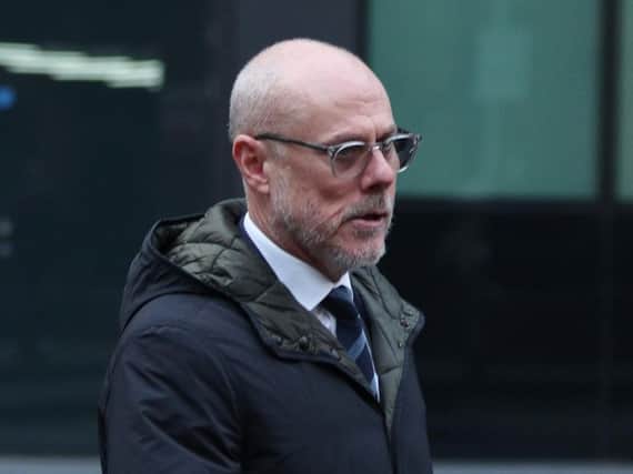The former assistant head coach of Barnsley FC, Tommy Wright, arrives at Southwark Crown Court.