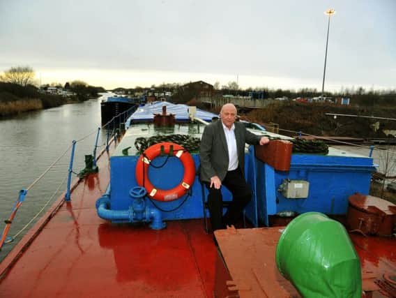 John Branford, from Goole, on one of his three barges, Farndale, moored at Goole