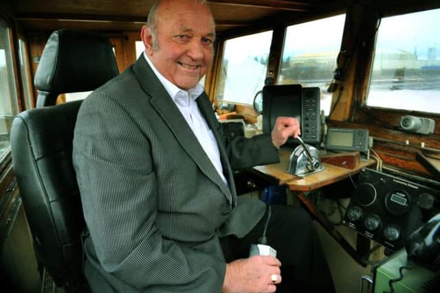 John Branford from Goole in the wheelhouse of his barge Farndale Picture: Gary Longbottom