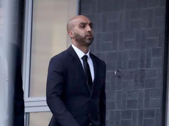 West Yorkshire Police officer Amjad Hussain, 35, who also uses the surname Ditta, is pictured arriving at court.