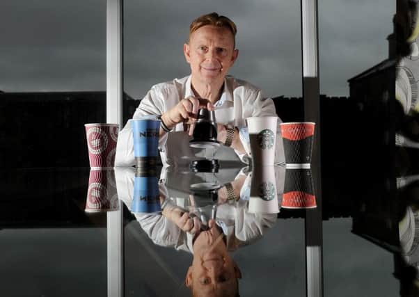 Richard Wolfenden pictured with his invention called Lid Safe. Picture: Simon Hulme