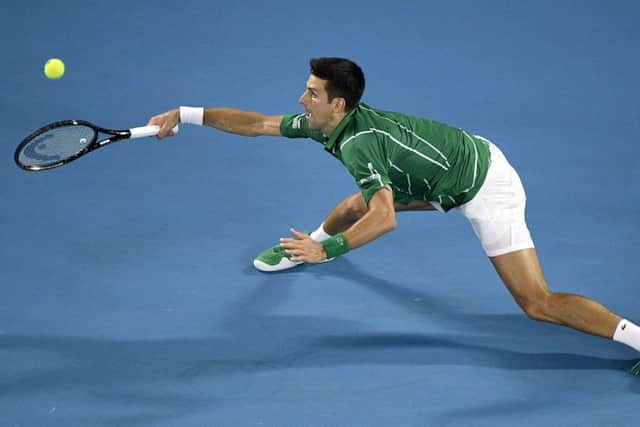 Serbia's Novak Djokovic makes a forehand return to Germany's Jan-Lennard Struff in Melbourne. Picture: AP/Andy Brownbill