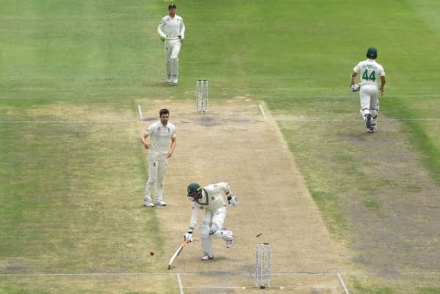 South Africa batsman Keshav Maharaj is run out by Sam Curran (not pictured) as Mark Wood celebrates and England take the final wicket in Port Elizabeth. Picture: Stu Forster/Getty Images