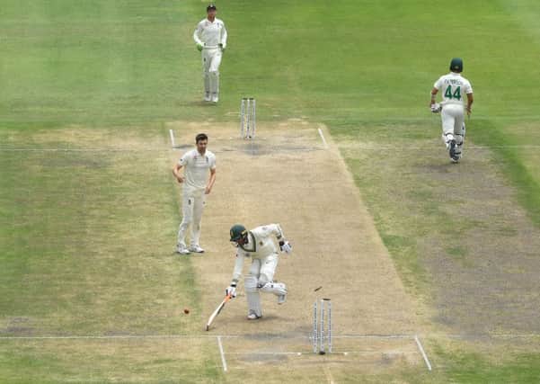 South Africa batsman Keshav Maharaj is run out by Sam Curran (not pictured)  as Mark Wood celebrates and England take the final wicket in Port Elizabeth. Picture: Stu Forster/Getty Images