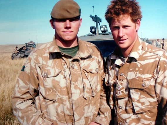 Cpl Liam Riley with Prince Harry on a training exercise in Canada.