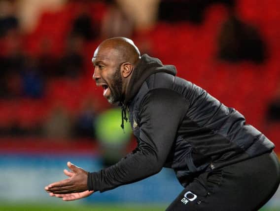Darren Moore is leaving Doncaster Rovers' transfer dealing in the hands of others during the build-up to Friday's League One trip to Sunderland