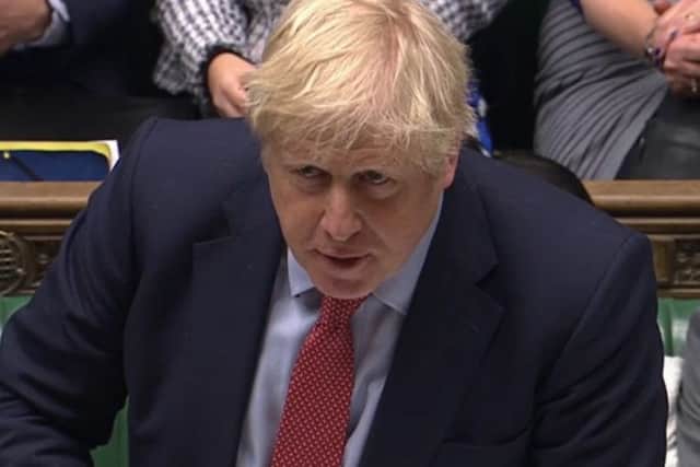 Three West Yorkshire MPs pressed Boris Johnson at Prime Minister's Questions over Northern rail services.