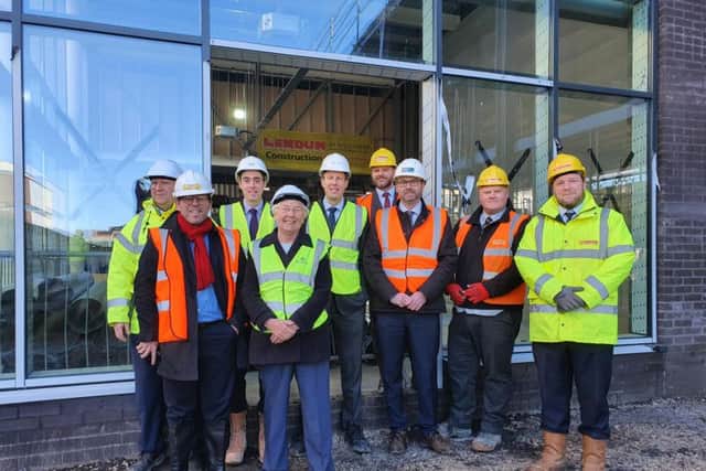 Celebrations as the roof is finished at Doncaster's Savoy. Picture: Doncaster Council.