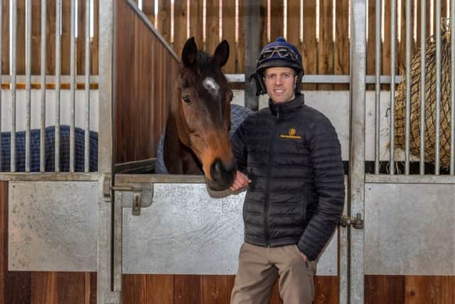 Adam Nicol with Lady Buttons at Phil Kirby's stables.