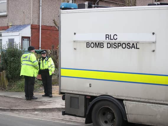 Police alongside a bomb disposal team as they conduct a search around houses in Bradford after a 38-year-old man was arrested on suspicion of explosives offences. Credit: Danny Lawson/PA Wire