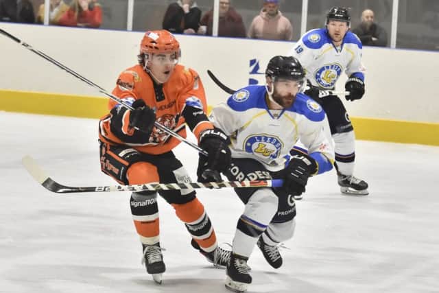 THE TIME IS NOW: Leeds Chiefs' player-coach, Sam Zajac, battles with Telford's Brandon Whistle last Sunday. Picture courtesy of Steve Brodie.