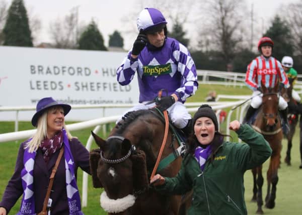 YOU WIN AGAIN: Jockey Sean Quinlan celebrates after Lady Buttonss second successive win in the Casino Restaurant Owlerton Sheffield Yorkshire Rose Mares Hurdle at Doncaster. Picture courtesy of Phill Andrews.