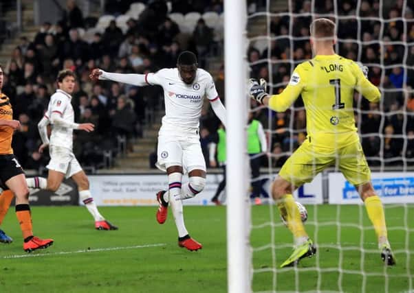 Chelsea's Fikayo Tomori (centre) scores his side's second goal at the KCOM Stadium. Picture: Mike Egerton/PA