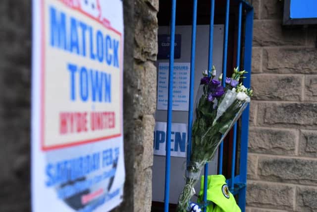 Tributes left outside the ground of Matlock Town Football Club after footballer Jordan Sinnott died in hospital shortly before 6pm on Saturday. Jacob King/PA Wire