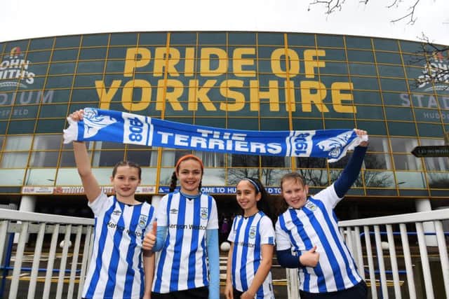 Young fans get ready for Huddersfield Town Ladies first match at the John Smith's Stadium against Ipswich Town Ladies in the FA Cup.