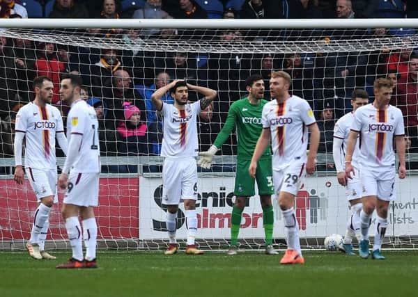 DAY TO FORGET: Bradford City's players after Mansfield's second goal. Picture: Jonathan Gawthorpe.