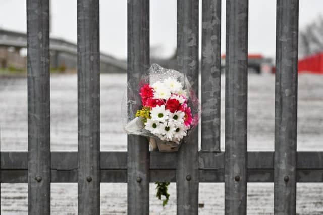 Flowers left outside the ground of Alfreton Town Football Club after footballer Jordan Sinnott died in hospital shortly before 6pm on Saturday