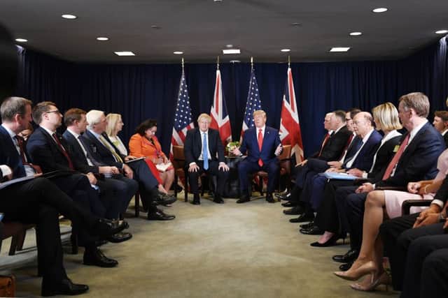 Prime Minister Boris Johnson (centre left) meets US President Donald Trump at the 74th Session of the UN General Assembly, at the United Nations Headquarters in New York, USA. PA Photo. Picture date: Tuesday September 24, 2019. Mr Johnson will return to the UK Wednesday following the decision at the Supreme Court ruled that his advice to the Queen to suspend Parliament for five weeks was unlawful. See PA story POLITICS UN. Photo credit should read: Stefan Rousseau/PA Wire