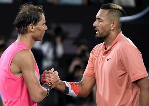 RESPECT DUE: Rafael Nadal shakes hands with Nick Kyrgios after their encounter in Melbourne. Picture: AP/Andy Brownbill