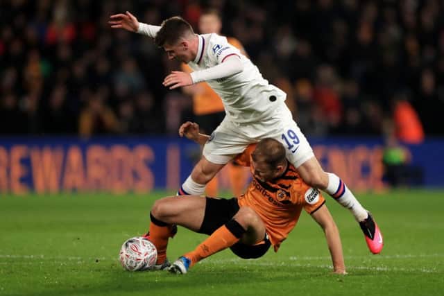 Chelsea's Mason Mount (right) collides with Hull City's Herbie Kane (Picture: PA)