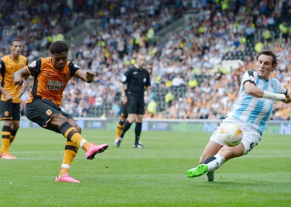 Hull City's Chuba Akpom scores his side's second goal against Huddersfield Town in August 2015. Picture: Anna Gowthorpe