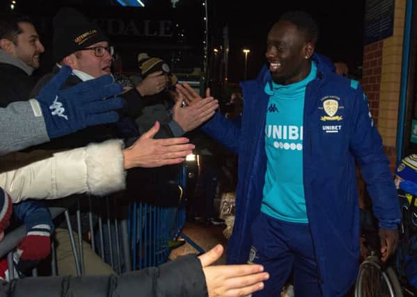 What will Jean-Kevin Augustin, who is pictured greeting Leeds United fans upon his arrival at Elland Road on Tuesday night, be? (Picture Bruce Rollinson)