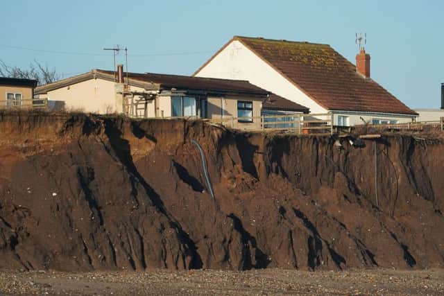 Coastal erosion has left homes in Skipsea, and along the Holderness coast, perilously close to the cliff.