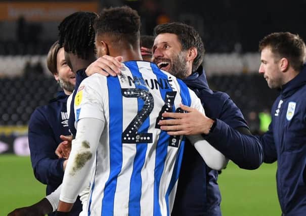Steve Mounie is contratulated by his manager Danny Cowley.
(Picture: Jonathan gawthorpe)