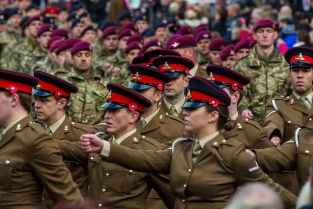 Armed Forces members at a Remembrance Day parade in Leeds city centre