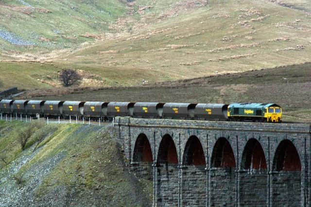 A Freightliner train on Ribblehead Viaduct
