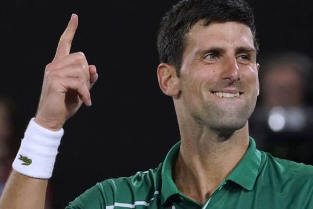 Serbia's Novak Djokovic celebrates after defeating Switzerland's Roger Federer. (AP Photo/Lee Jin-man)