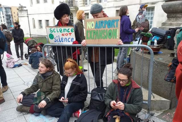 Climate protesters outside Leeds Civic Hall on Thursday, where a meeting over the expansion of Leeds Bradford Airport was disrupted by activists staging a "die-in". Picture: Sarah Mumford