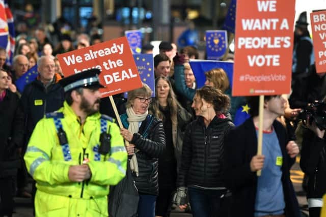 Anti-Brexit protesters during a rally in Leeds city centre