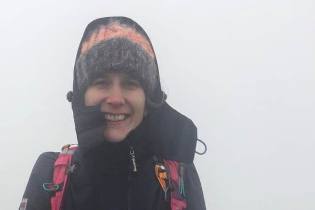 Gill Barker, pictured at the top of Mount Snowdon as part of the 35 before 35 challenge.