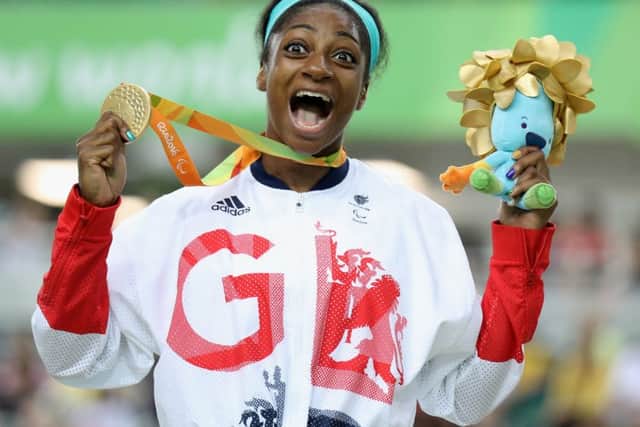 MAGIC MOMENT: Kadeena Cox of Great Britain celebrates on the podium after winning Women's C4-5 500m Time Trial at the Rio 2016 Paralympic Games. Picture: Friedemann Vogel/Getty Images