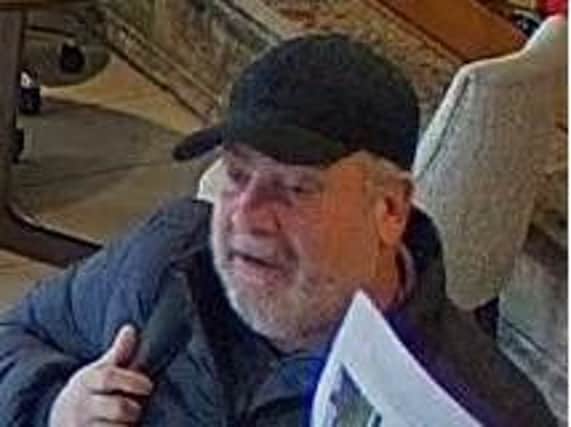 The man is described as white, in his 50s, with a grey beard and short hair.