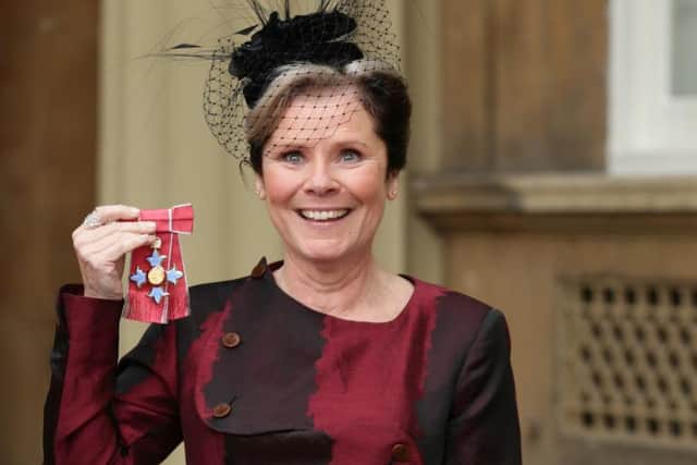 Actress Imelda Staunton after receiving a CBE from the Duke of Cambridge for services to drama at an investiture ceremony at Buckingham Palace, London. Credit: Yui Mok/PA Wire.