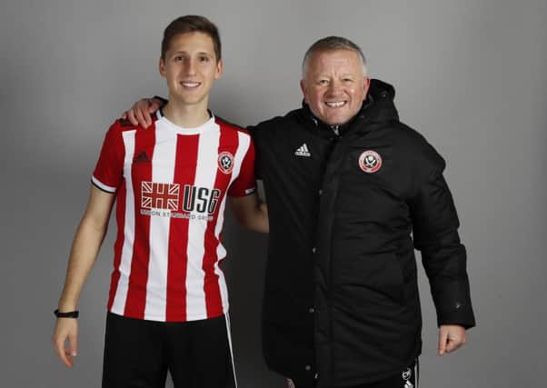 Panagiotis Retsos welcomed by manager Chris Wilder. Picture: Simon Bellis/Sportimage