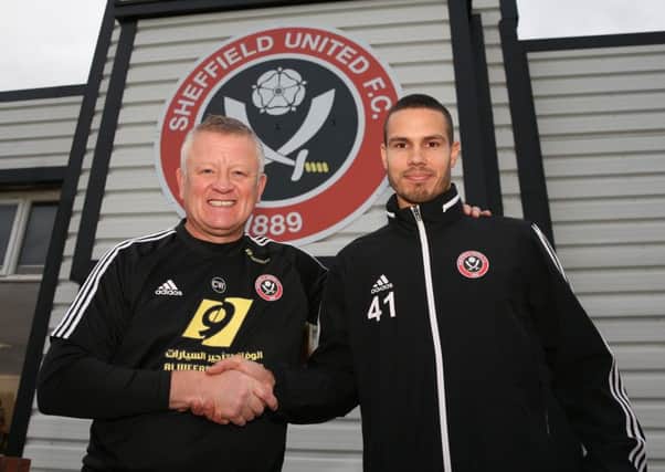 Chris Wilder with Jack Rodwell.