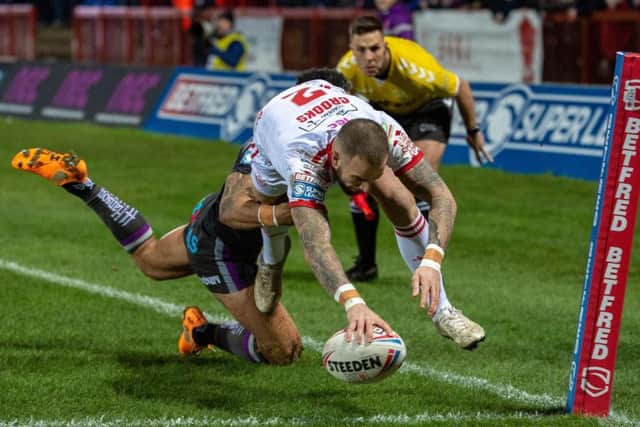 Hull KR's Ben Crooks goes in for his first try (BRUCE ROLLINSON)