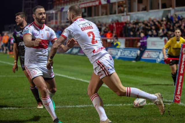 Ben Crooks, right, celebrates the first of his four tries with Hull KR team-mate Kane Linnett (BRUCE ROLLINSON)