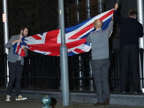 The Union flag is taken down outside the European Parliament in Brussels Picture: PA